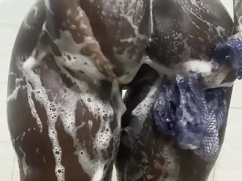 Brief-haired Nigerian ultra-cutie gets drenching raw with gusto in a red-hot bathroom