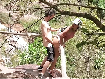 Observe Black nubile Oxalisexy get her slit penetrated in a public waterfall by a youthful Indian tourist