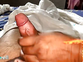 Obese Indian girl is providing a hand-job to her paramour and expecting to get banged, too