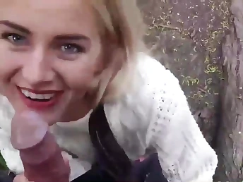 Sexy blonde having carnal knowledge in the matter of the public park exposing the brush pussy crevice