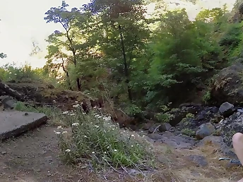 Overt girl outdoors masturbates fingering her shaved vagina